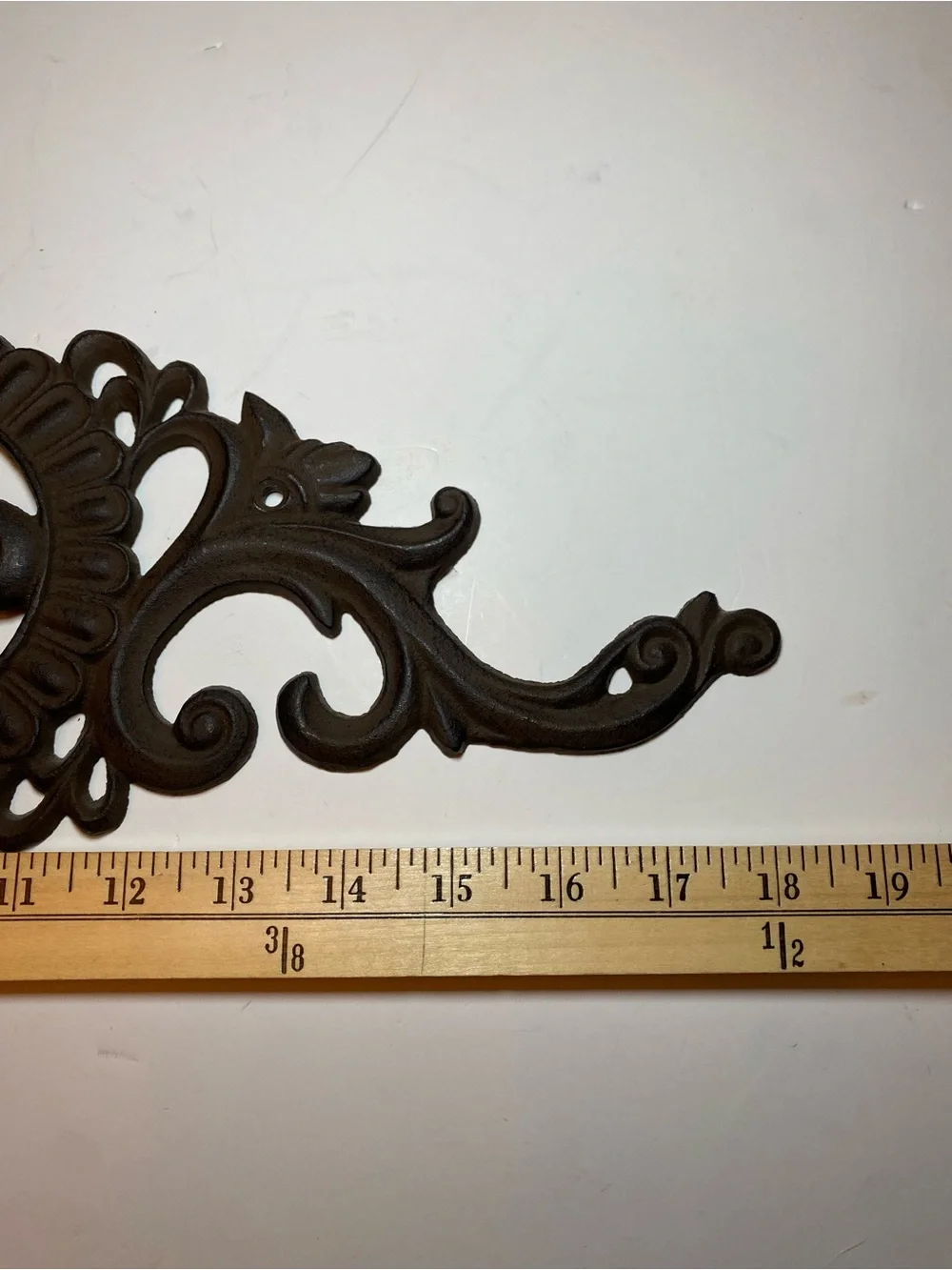 Decorative Fleur-de-Lis Metal Wall Accent in Dark Brown/Black 18 inches
